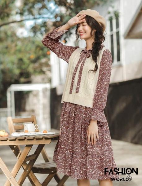 Mix váy cùng áo len gile để tạo phong cách vintage thời trang Hàn Quốc